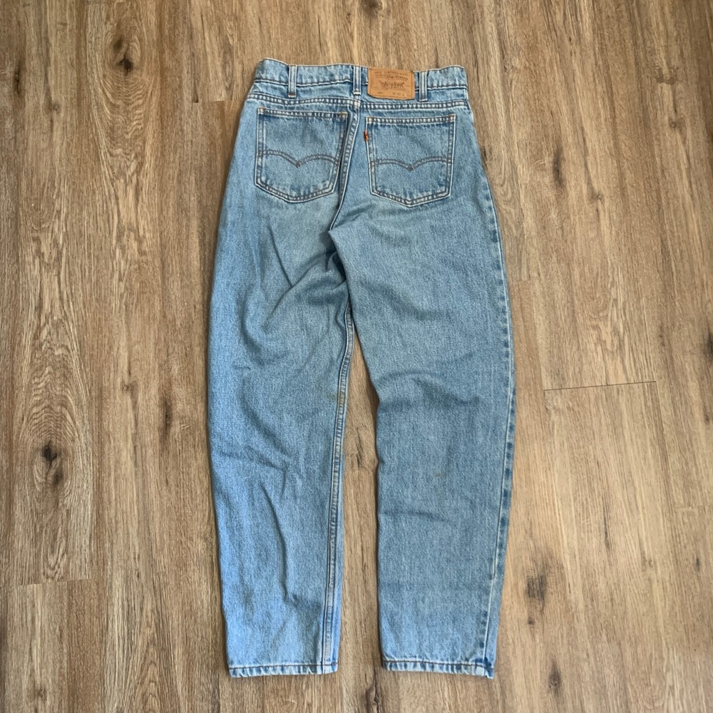 Vintage 80s Levi's 550 orange tab tapered leg denim jeans in light wash - 30x30